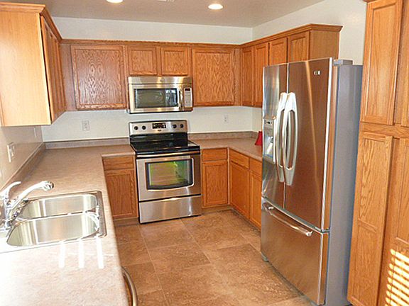 Bright Kitchen With New Appliances