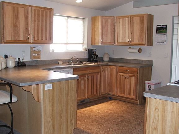 Kitchen offers lots of storage.