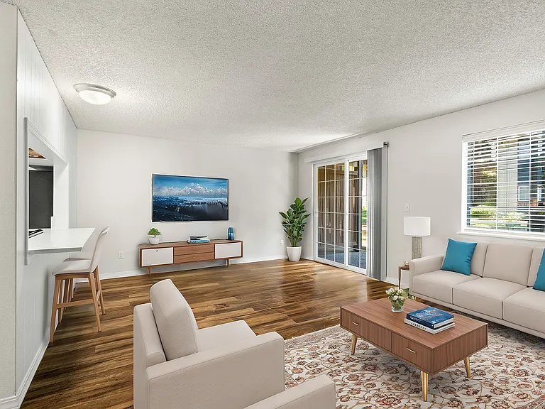Experience comfort and style in this elegantly designed living room with abundant natural light. Experience comfort and style in this elegantly designed living room with abundant natural light.