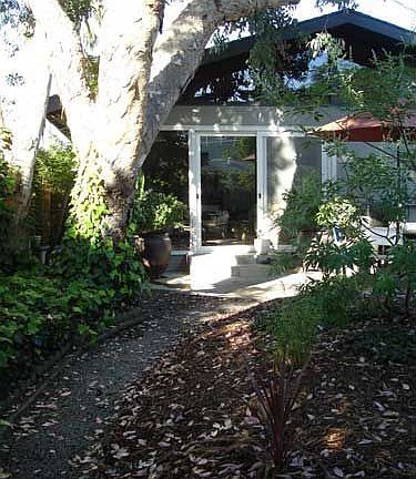 Back yard with decomposed granite path.