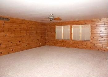 A great living room ....knotty pine walls