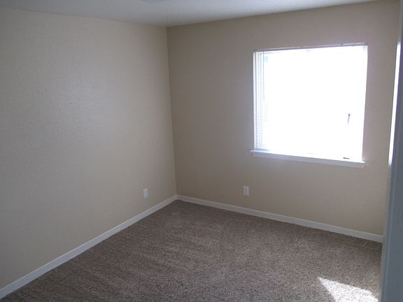 Bedroom with carpet