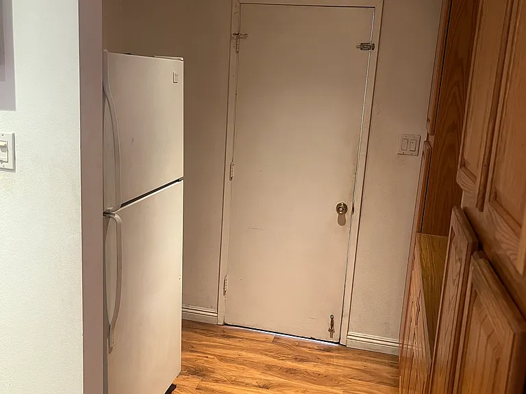 Kitchen 2 with fridge and garage access