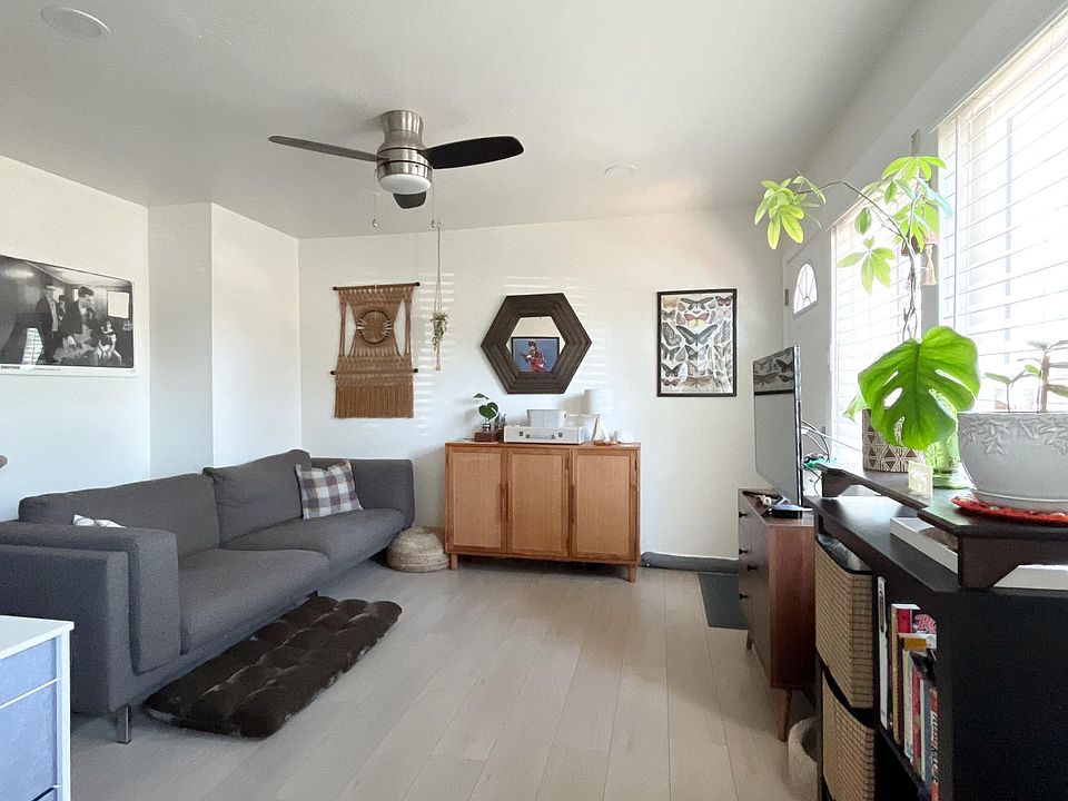 Living room area that opens up to the Kitchen