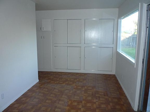Craft/project/hobby room with plenty of light and cabinets