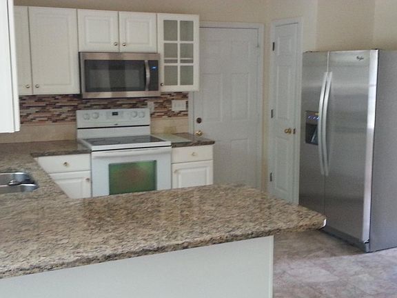 Brand new stainless steel fridge and microwave