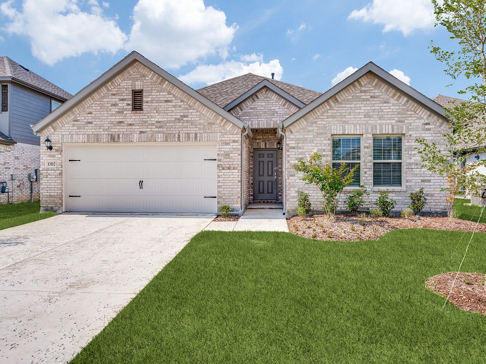 Attached 2 car garage, landscaping and sprinkler system