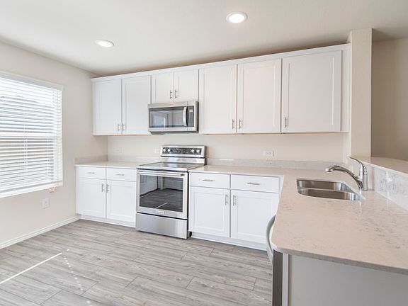 Abundant cabinet space in kitchen