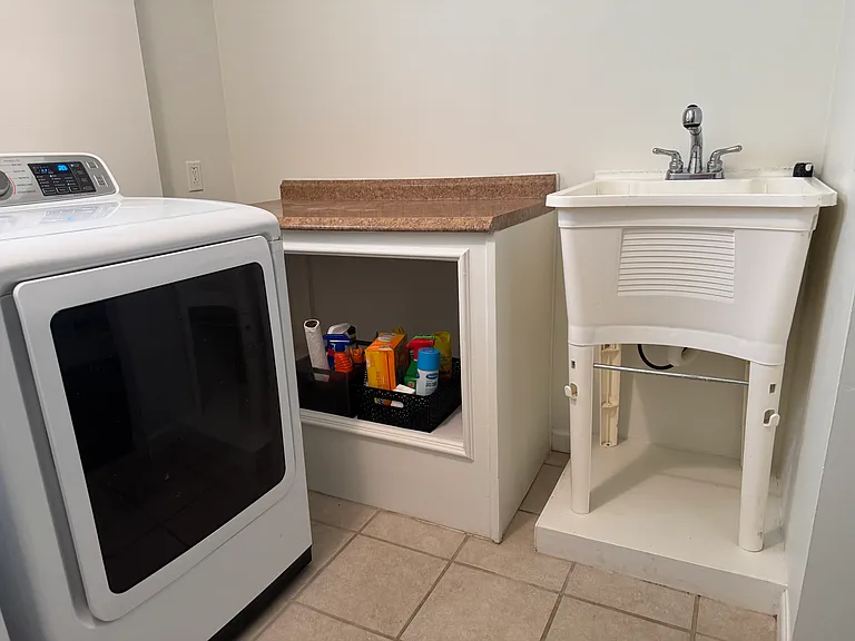 Laundry + slop sink.