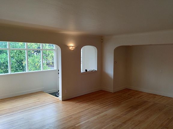 Looking toward front door from living room.