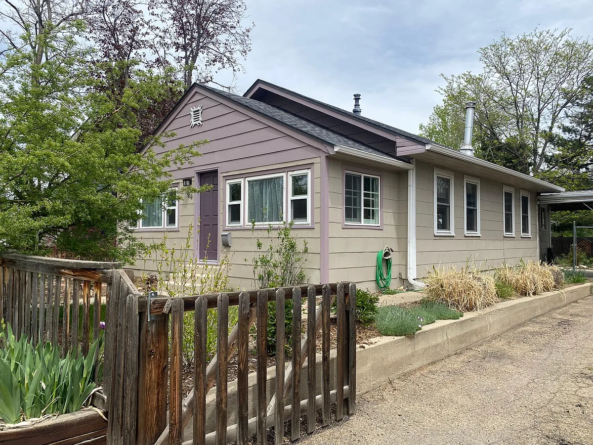 Gem of a home near both I25 &I70 AND in a quiet neighborhood. 

Spacious driveway with car port. - 5074 N Osceola St