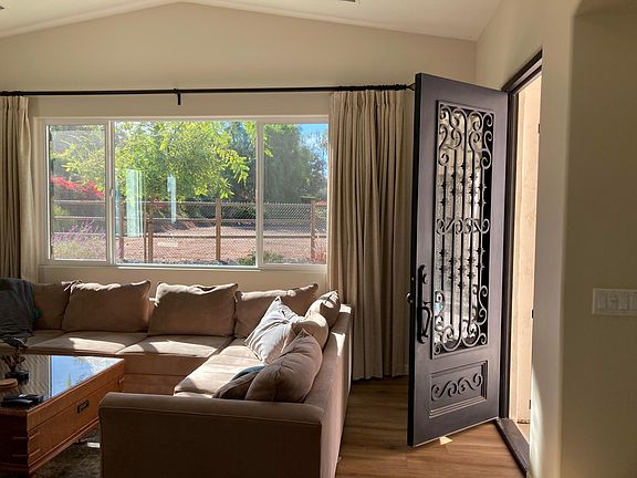 Front door opens to lvgrm w/ big picture window