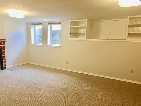 New shelves and hidden storage in living room