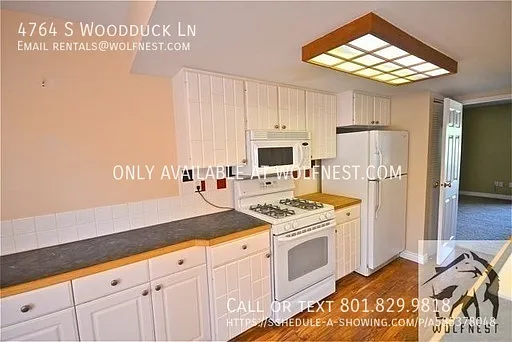 4764 S Woodduck Ln — Photo 3