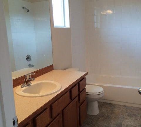Master Bathroom with upgraded tile tub surround