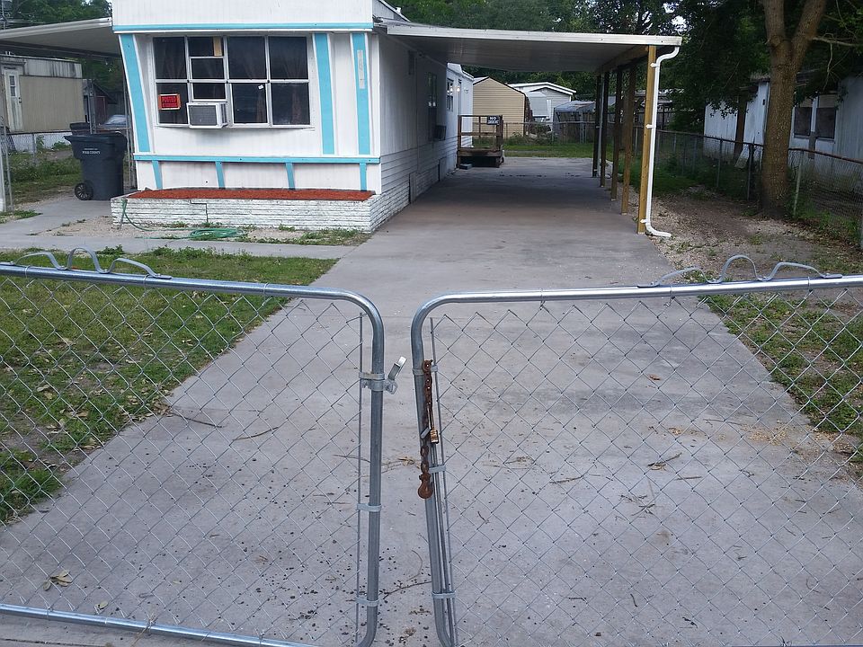 front yard fenced and gated