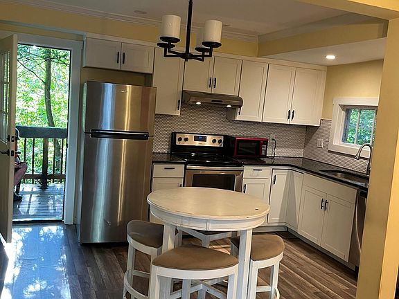 Kitchen opens to back porch