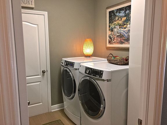 Separate Laundry Room.