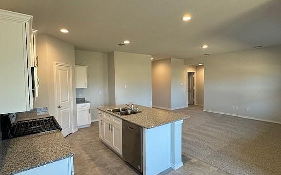 Kitchen - All Home and community information, including pricing, included features, terms, availability and amenities, are subject to change at any time without notice or obligation. All Drawings, pictures, photographs, video, square footages, floor plans, elevations, features, colors and sizes are approximate for illustration purposes only and will vary from the homes as built.