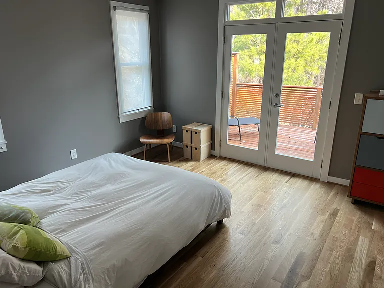 Master bedoom. Upstairs, with walkout to balcony/deck. Furniture included in rental.