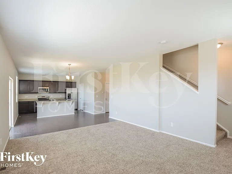 6481 N Dunkirk Ct — Photo 3