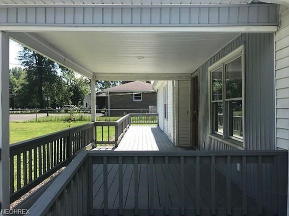 Large front covered patio deck.