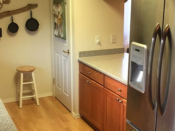 Kitchen with granite countertops and updated appliances