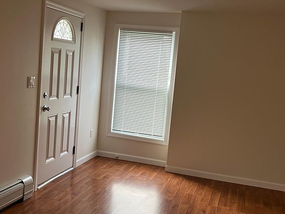 Entrance with door shut. Lots of sunshine coming in