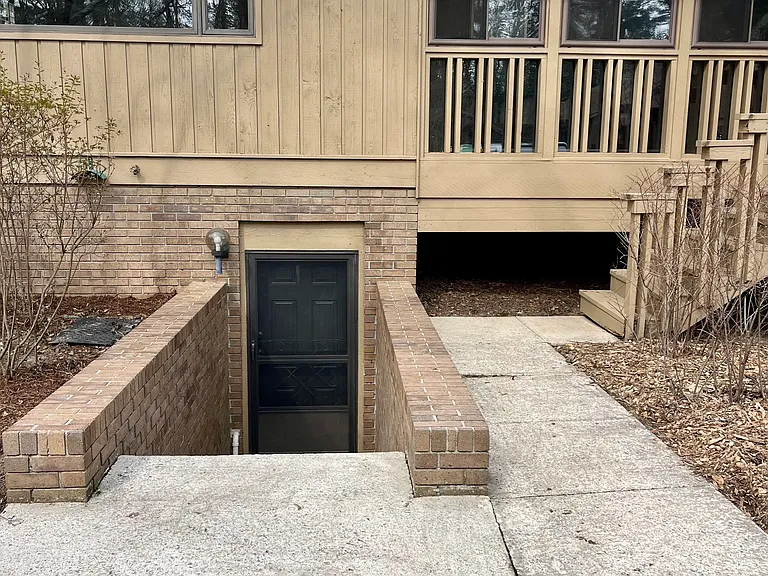 Back of condo showing basement access.
