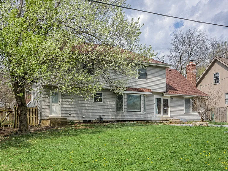 Large, fenced backyard with patio area