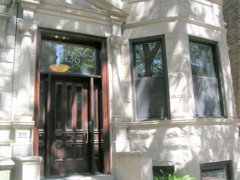Beautifully restored classic Chicago greystone elevation. One of the finest total gut renovations in Little Italy