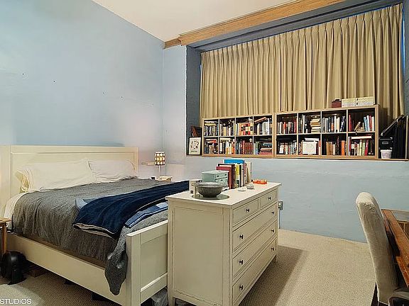 Master bedroom with custom blackout curtains