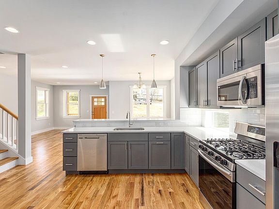 Gourmet Kitchen Opens to Living Room