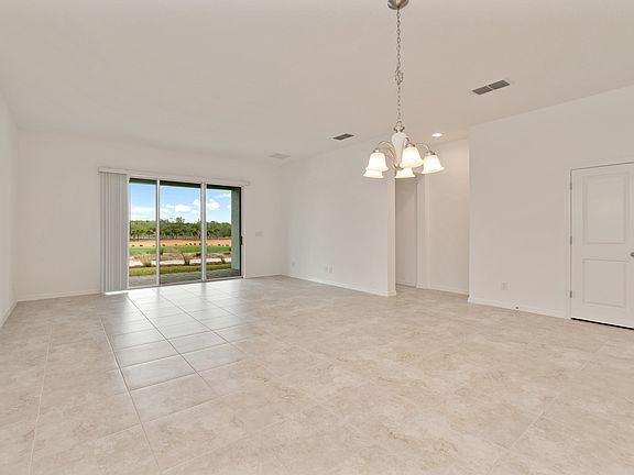 Sliding glass doors overlook lanai