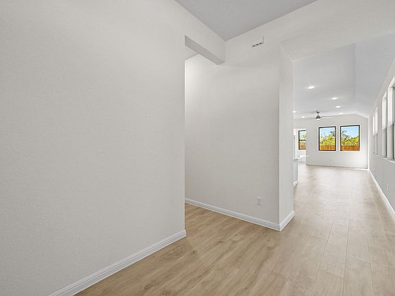 Entry in the Cedar home plan by Trophy Signature Homes - REPRESENTATIVE PHOTO