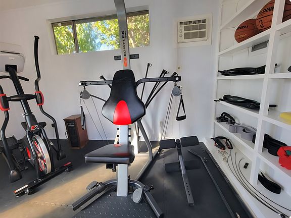 Pool House (We use as a gym and will leave the flooring if you want it)