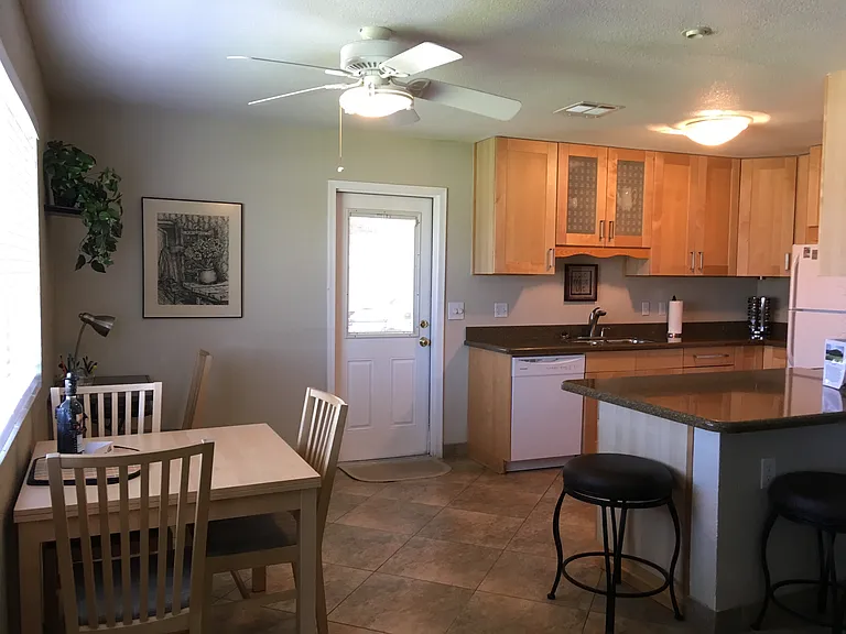 Another view from living room to dining room and kitchen.