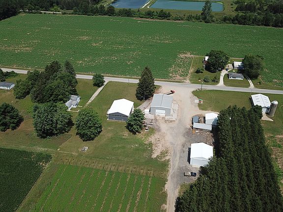 farm house, hops building, welding shop, migrant homes and additional outbuildings