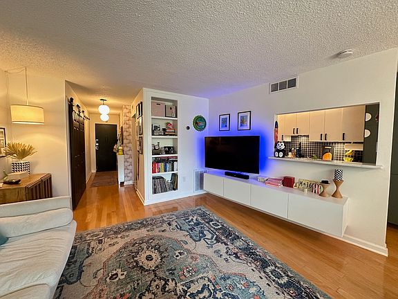 Large living space, great for hosting
(TV, entertainment center, sofa and rug all included in rent)