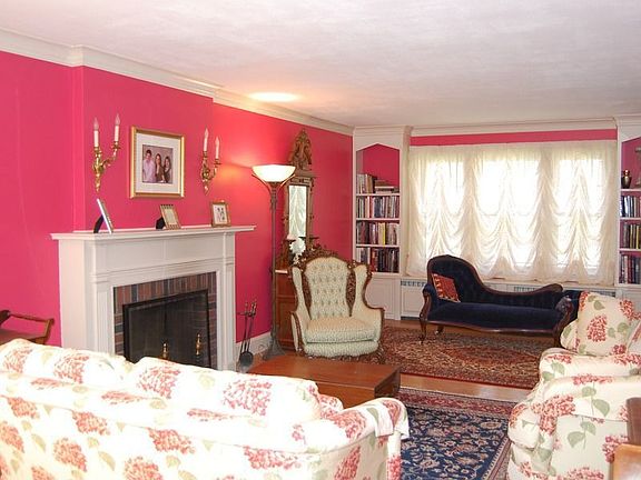 Living room with french doors.Walk out to the deck. Enjoy the fireplace on a cold winter night.
