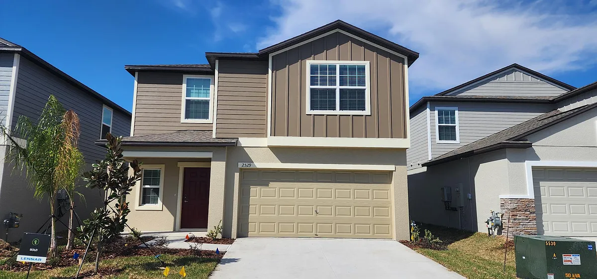 Photo 1 of 30 - 2529 Leonia Ln - Zephyrhills, FL Front Elevation - 2529 Leonia Ln