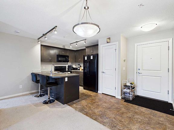 5th image of 402 Kincora Glen Rd NW #3307