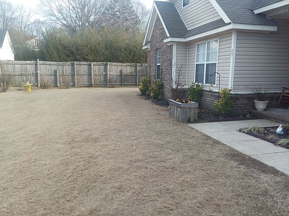 Treated lawn with flower bed
