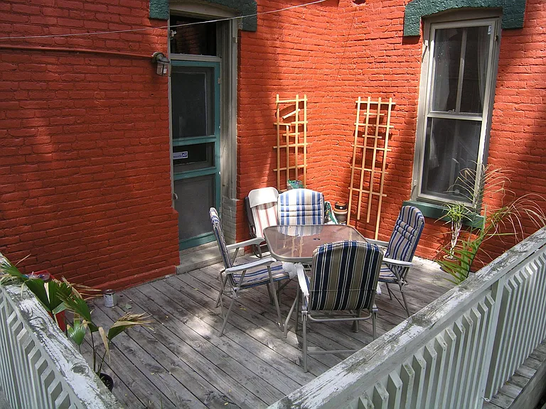 This private deck is accessed from the kitchen.