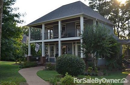 Front of House
						:
						Upper and lower front porches.