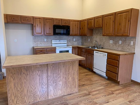 Kitchen includes range, microwave & dishwasher