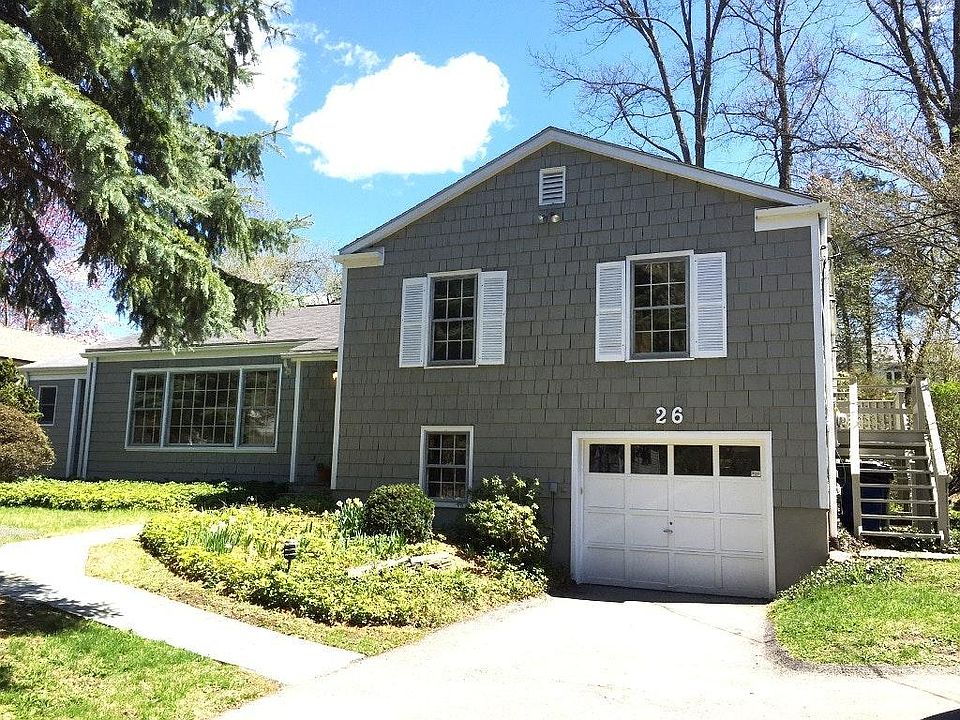 Welcome Home to this Lovely Split Level Ranch in a Quaint Central Greenwich Neighborhood!