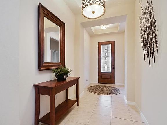 Beautiful foyer with leaded glass door