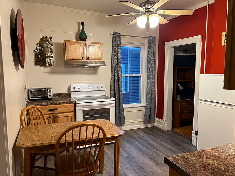 Kitchen with stove/oven and toaster oven