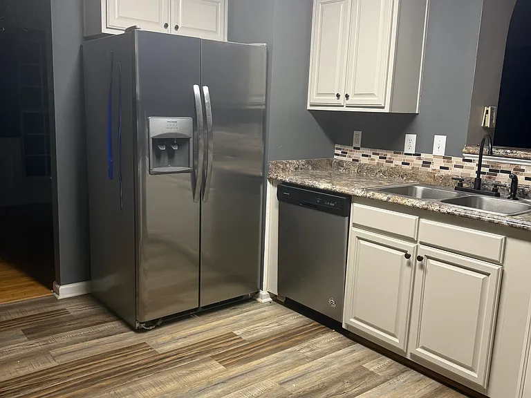 Updated Kitchen: New Appliances, Countertops, Flooring, Cabinets and more.